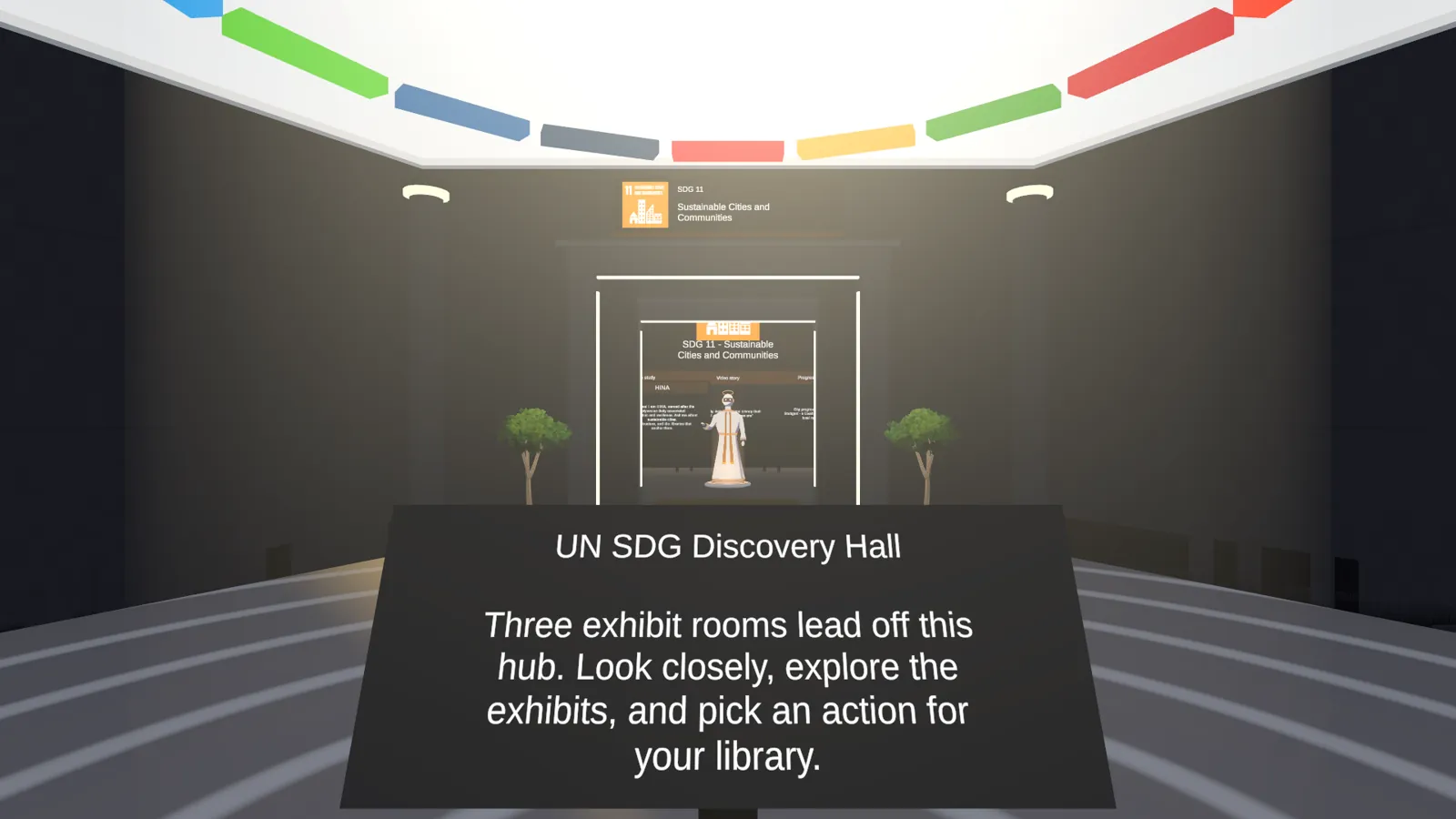 Discovery Hall hub with the UN SDG Discovery Hall welcome sign and the SDG 11 room ahead